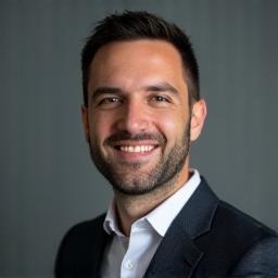 Professional headshot of Ricardo Mendes, Publishing Manager
